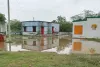 परिसर में बारिश का पानी भरने से बेसिक शिक्षा विभाग की ओर से की गई व्यवस्था की खुली पोल